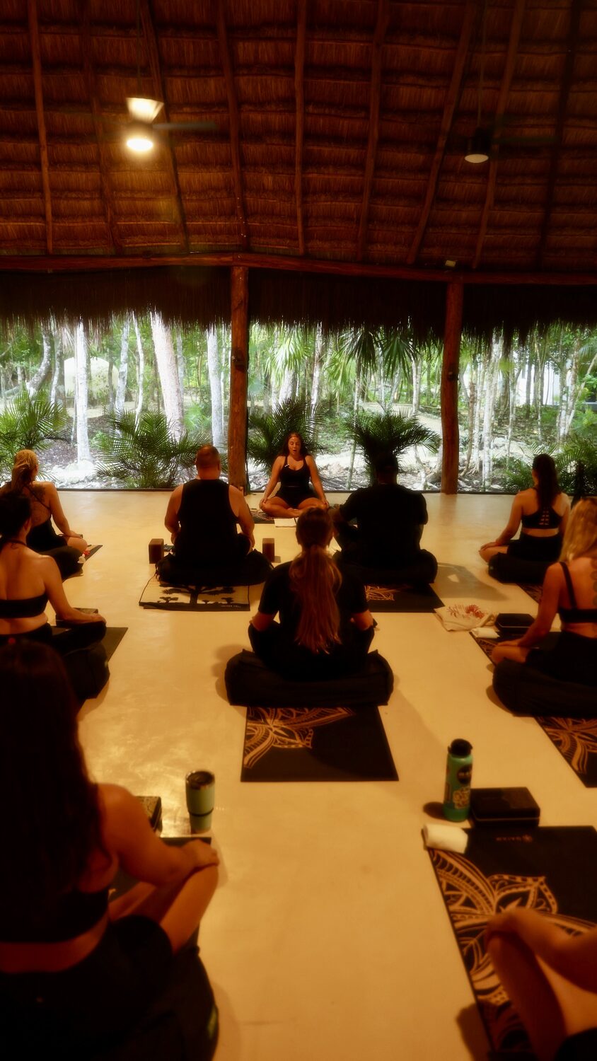 Candlelit evening practice in Tulum